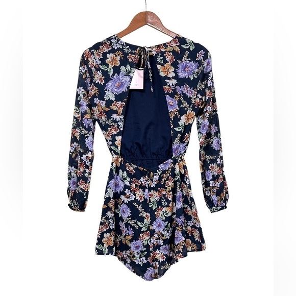 🆕 Showpo. Calling You Out Playsuit Navy Floral Tie Open Back Long Sleeve Romper - Picture 2 of 13